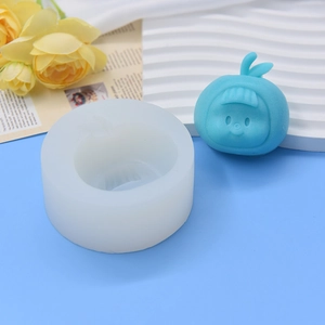DIY silicone mold for doll head sculptures featuring a matte finished character design