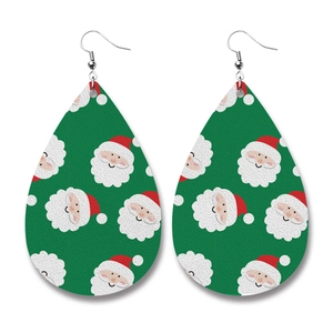 Detail of teardrop faux leather earrings featuring festive Santa Claus print and silver hooks