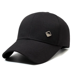 Classic black cotton baseball cap for men with a silver metal fashion badge on the side