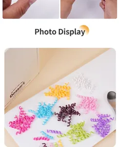 Close-up of colorful polymer clay spiral charms and imitation dessert decoration accessories
