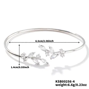 Detail view of willow leaf open cuff bracelet with dimensions 6.5cm and zircon inlays