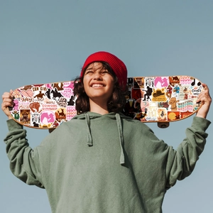 Pink and brown western cowboy stickers applied on a skateboard with high quality vinyl