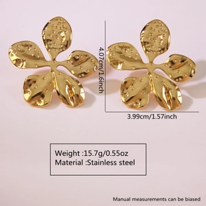 Close-up of golden stainless steel flower earrings with hammered texture and dimensions