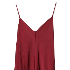 Elegant wine red satin slip dress featuring thin straps and a deep V-neckline