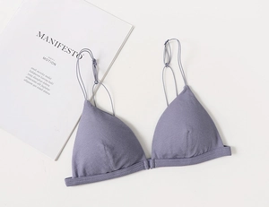 Detailed flat lay of lavender ribbed triangle bralette with minimalist magazine context