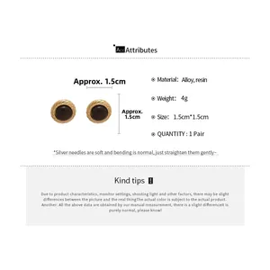 Detail view of vintage tiger eye geometric studs with gold woven edge and product specs