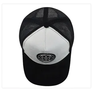 Black and white mesh trucker hat with Enjoy Life round patch shown from a top view