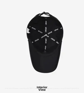 Interior detail of black sports cap showing reinforced seams with SPORT lettering