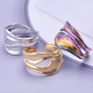 Minimalist snake-shaped stainless steel open rings in gold, silver, and iridescent colors