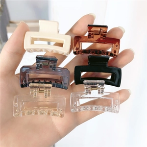 Detailed close-up of six-piece rectangular hair claws set in various aesthetic colors