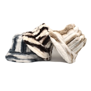 Winter tie-dye striped faux fur bucket hats in blue, black, and beige plush textures