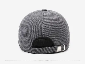Detail view of the textured back and adjustable metal buckle on this men's winter cap