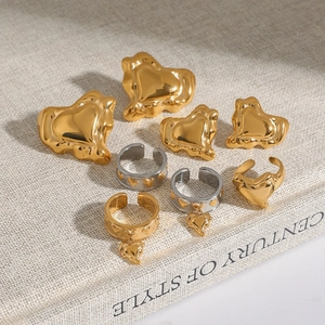 Golden and silver stainless steel jewelry set with heart rings and matching earrings