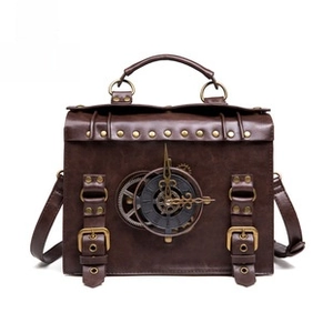 Detail of steampunk shoulder bag showing vintage gears, clock motifs and brass studs