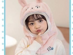 Close-up of pink plush bunny hat with soft fleece texture and cute BAO fabric label