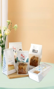 Close-up of kraft paper toast bags with transparent windows and wire ties for bakery packaging