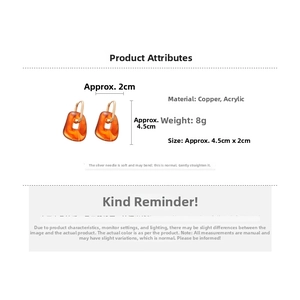 Detail view of amber acrylic square pendant earrings with gold metal hoops and measurements