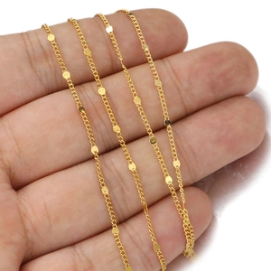 Minimalist gold stainless steel satellite chain necklace featuring small flat metal discs