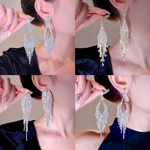 Elegant long silver tassel earrings with sparkling rhinestones for formal evening parties