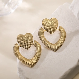 Chic 18K gold plated stainless steel heart earrings with textured dotted relief design