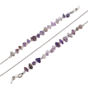 Detail of silver chain with purple amethyst stones and adjustable rubber loops