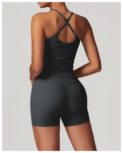 Detailed back view of dark grey cross-strap yoga top and high-waisted shorts