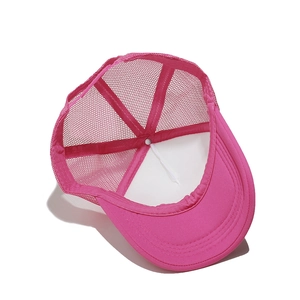Hot pink mesh trucker hat showing internal structure and breathable mesh detail
