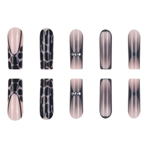 Press-on nails featuring long round shape with black leopard print and pink gradient