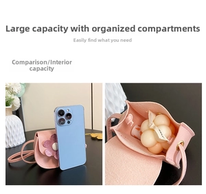 Detail view of mini pink flower crossbody bag showing internal capacity and size comparison