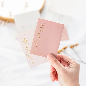 Pink gold foil Thank You cards held by hand, minimalist stationery for gifts