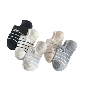 Five pack of women's low cut cotton socks with striped patterns and zebra embroidery