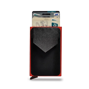 Detail of red aluminum frame RFID wallet with cross-pattern leather and pop-up lever