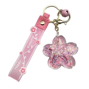 Pink sakura starfish liquid quicksand keychain with bell and printed floral strap