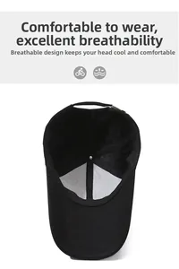 Detail view of the breathable mesh interior and adjustable strap of the black baseball cap