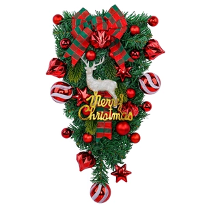 Christmas teardrop wreath with white reindeer, red berries and festive plaid bow decoration