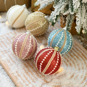Glittery 8cm Christmas foam balls with pearls on snowy background for holiday tree decor