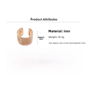 Detail view of woven texture on irregular rose gold wide metal bangle with dimensions