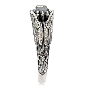 Vintage eagle claw ring for men featuring a black gemstone and gothic feather textures