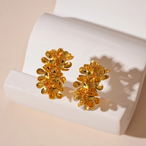 Minimalist gold flower cluster C-shape earrings with layered metallic floral design