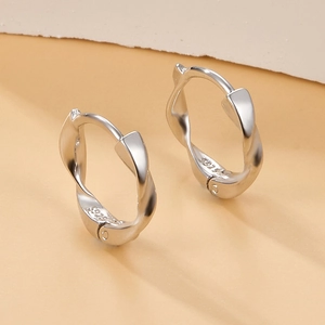 Elegant 925 sterling silver Mobius twist hoop earrings with high polished metallic luster
