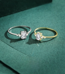 Macro detail of 925 sterling silver rings set with rectangular step-cut cubic zirconia
