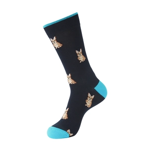Vue détaillée de chaussettes en coton bleu marine avec motifs corgi et bords bleus