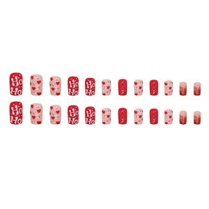 Red Christmas press-on nails set with glitter hearts and festive HO HO patterns