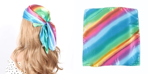 Detailed back view and flat layout of a rainbow striped silk square scarf for hair styling