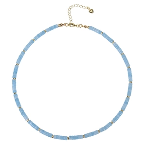 Detail view of light blue turquoise beaded necklace with golden lobster clasp and heart charm