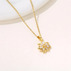 Elegant gold maple leaf pendant necklace with shimmering zircon crystals and fine O-chain