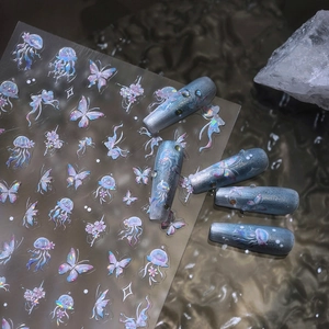 3D ocean theme nail stickers with jellyfish, butterfly, and starfish laser patterns