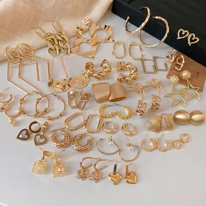Minimalist gold geometric square earrings and stud set with trendy metallic textures
