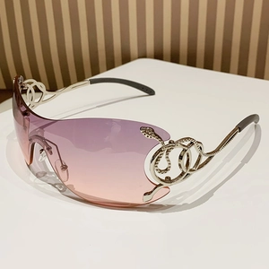 Frameless Y2K wrap sunglasses with pink gradient lenses and silver snake metal temples