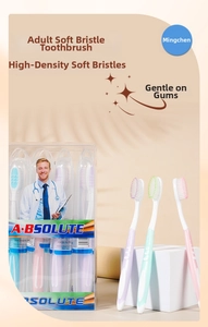 Detail of high-density soft bristles on premium toothbrushes in pastel colors